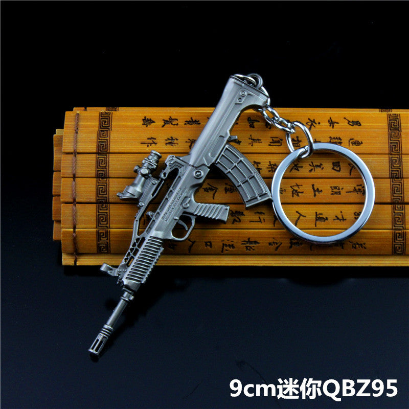 Wholesale  Helmet Flat Bottom Pot Backpack Signal Small Gun Keychain Metal Crafts Office Culture